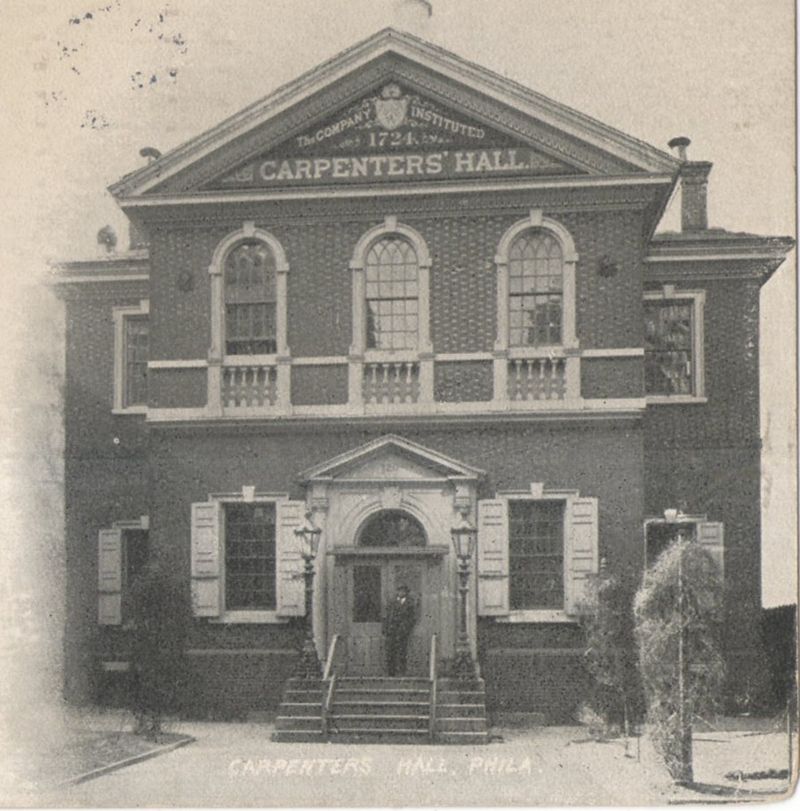 Old postcard view of Carpenters' Hall, a red brick Georgian building with a white cupola, set back behind a courtyard